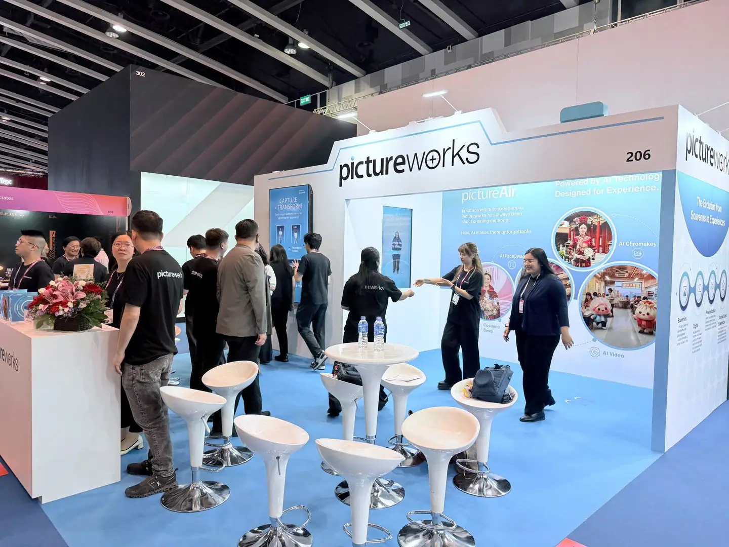 Visitors browsing the Pictureworks booth at IAAPA Expo Asia 2026