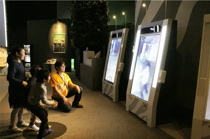 Guests using self-service imaging kiosks